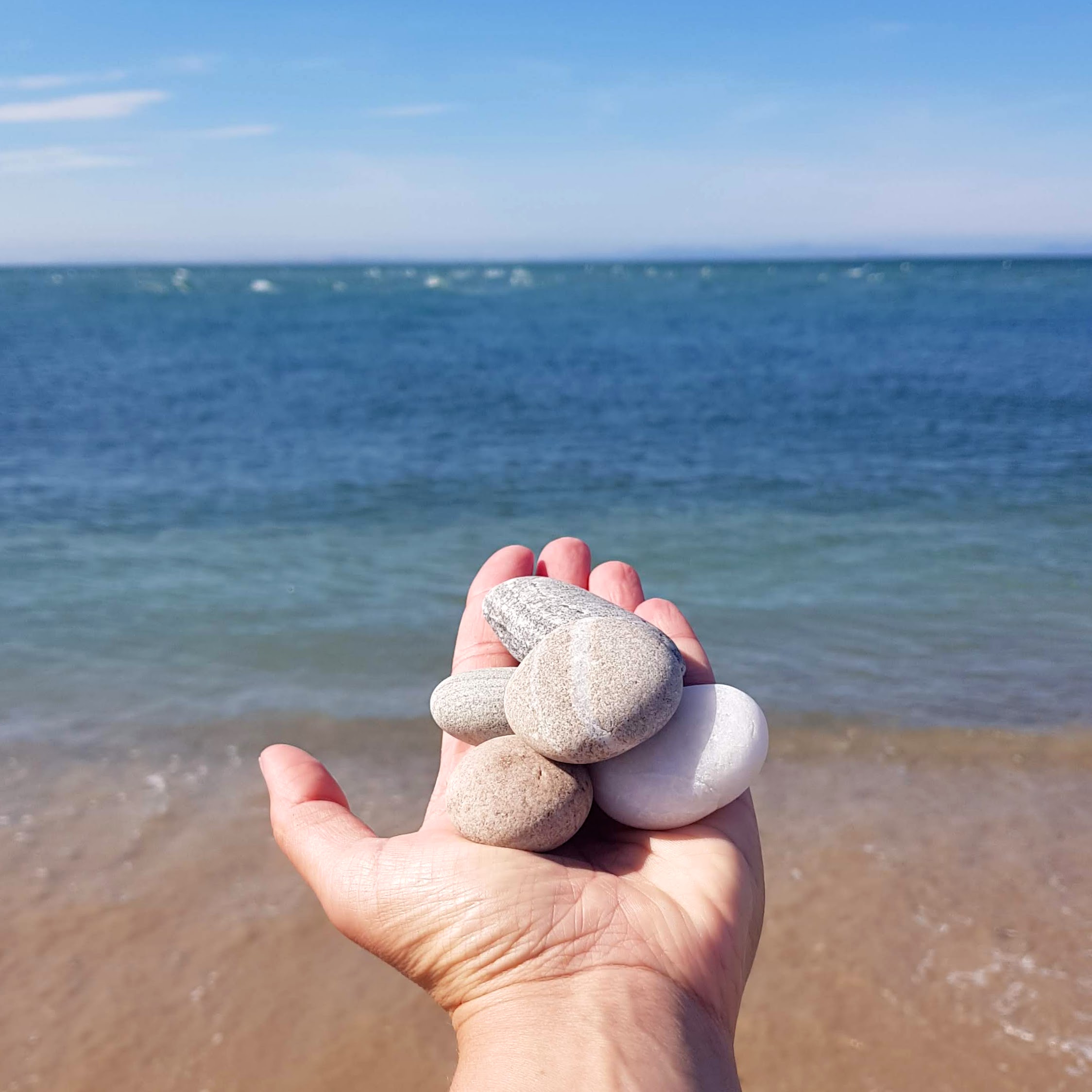 stones held in hands