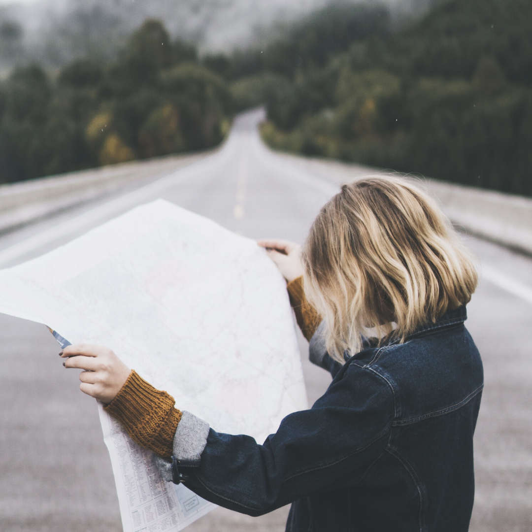 Woman reading map